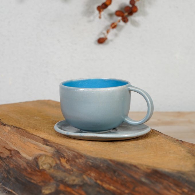 Double coloured cappuccino mug with saucer