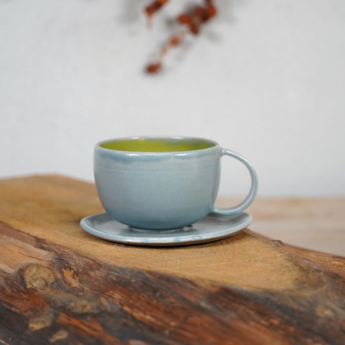 Double coloured cappuccino mug with saucer