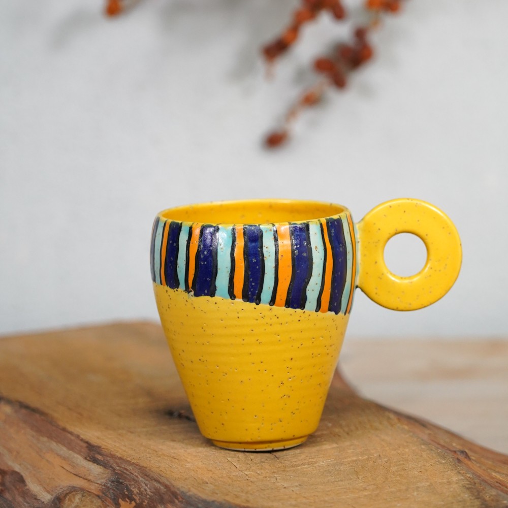 colourful stripes mug with yellow base