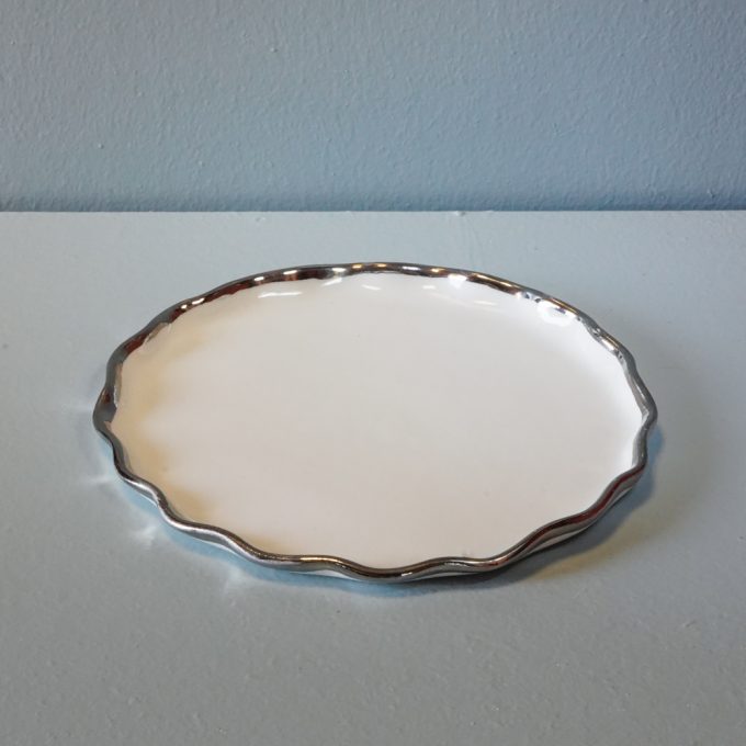 Handmade porcelain plate with silver