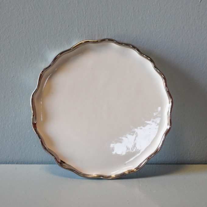 Handmade porcelain plate with silver