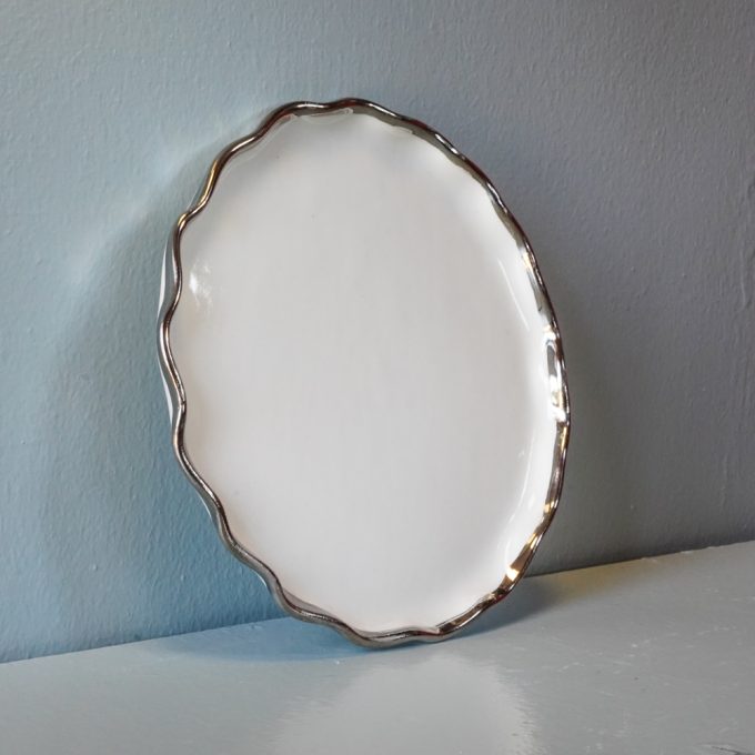 Handmade porcelain plate with silver