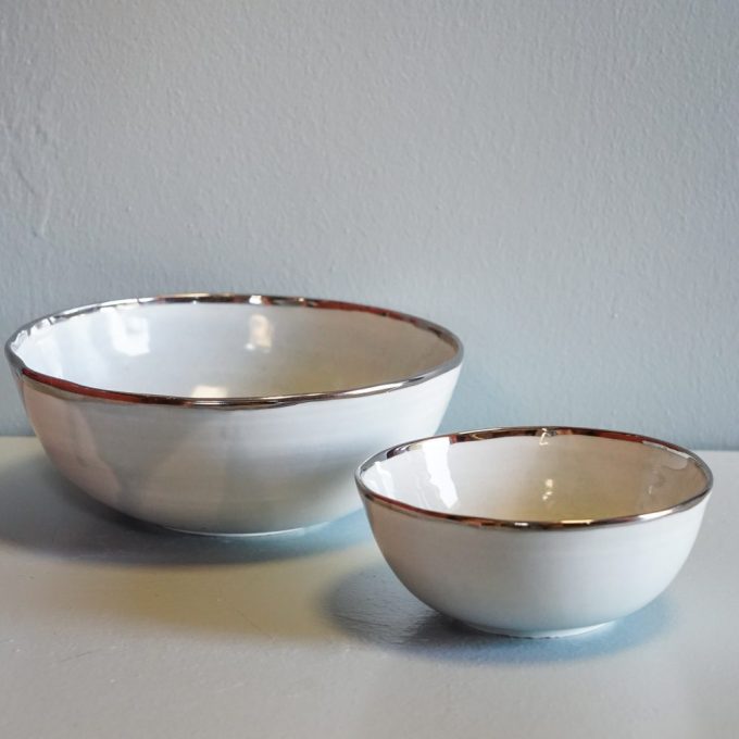 Handmade porcelain bowl with silver