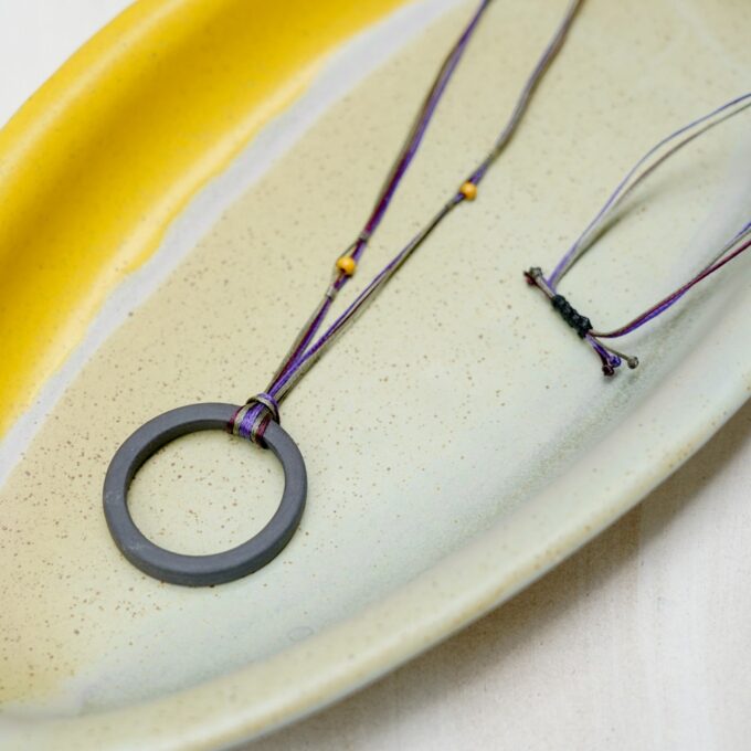 waxthread necklace with matte grey ceramic ring