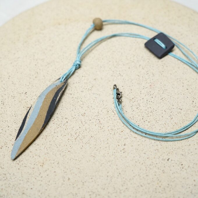 elongated ceramic leaf necklace with waxthread