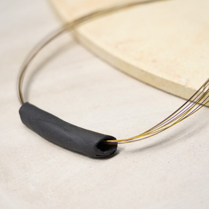 black ceramic tube necklace with multitone wire