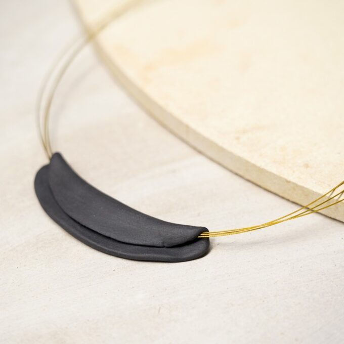 minimal wire necklace with layered ceramic form