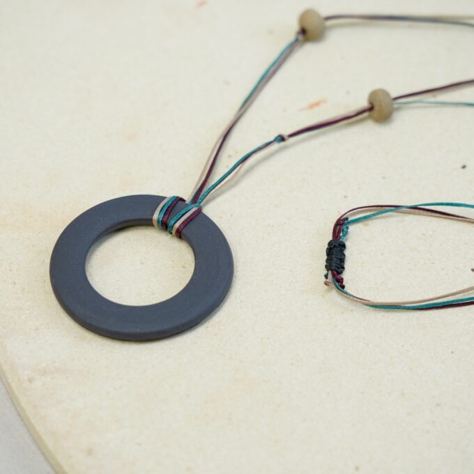 waxthread necklace with deep grey matte ceramic disc