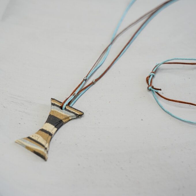 waxthread necklace with flared waist ceramic element