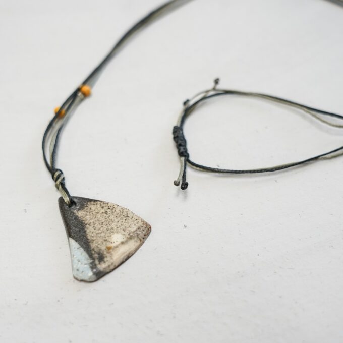 waxthread necklace with asymmetrical trapezoid ceramic element