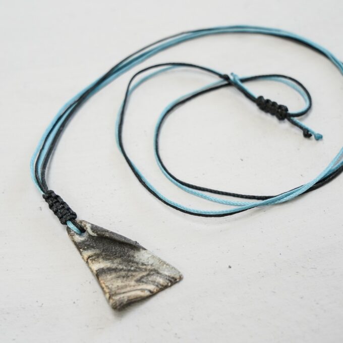 black and blue waxthread necklace with slanted ceramic triangle