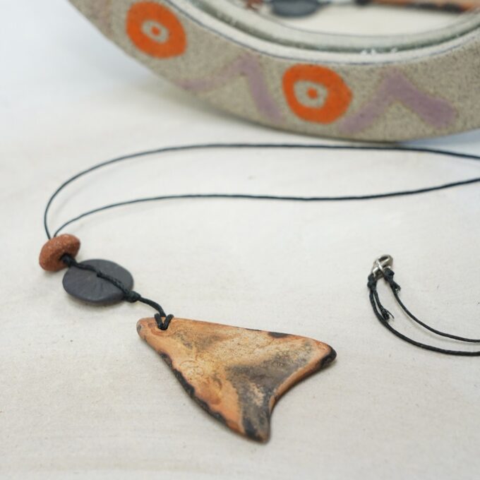 waxthread necklace with asymmetrical burnt clay ceramic element