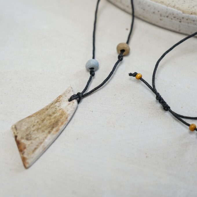 black waxthread necklace with ceramic shard element