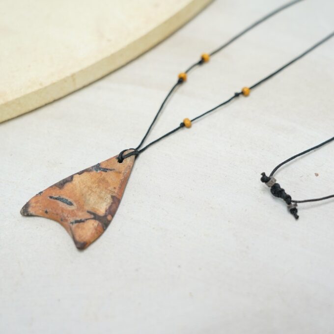 waxthread necklace with burnt terracotta ceramic triangle
