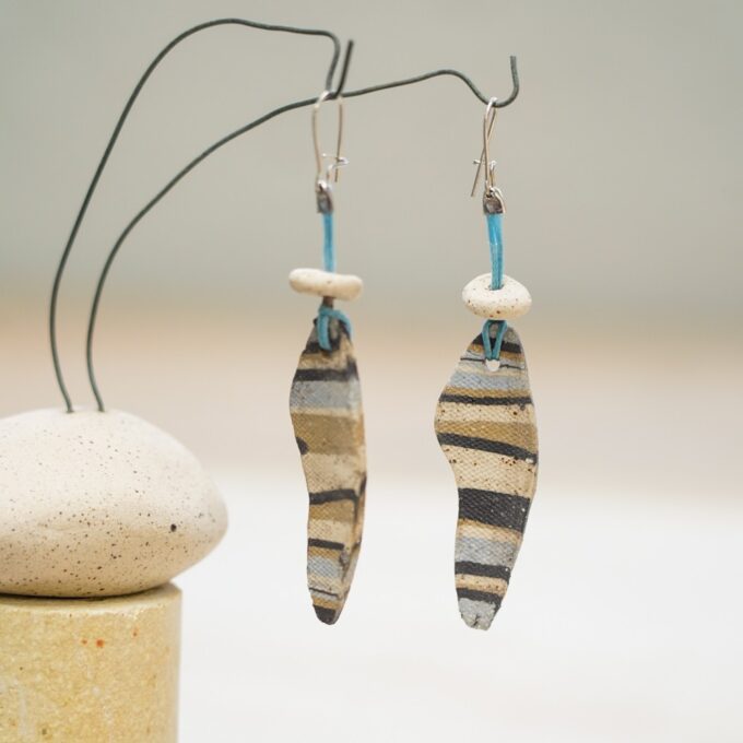 waxthread earrings with striped ceramic drop elements