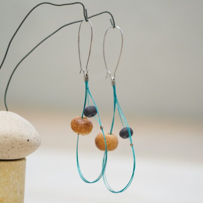 handmade ceramic bead earrings with turquoise wire loops