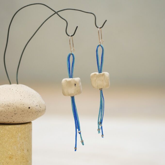 cubic ceramic earrings with blue waxed thread