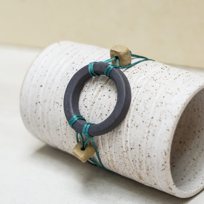 unique waxthread bracelet with handmade black porcelain ring element