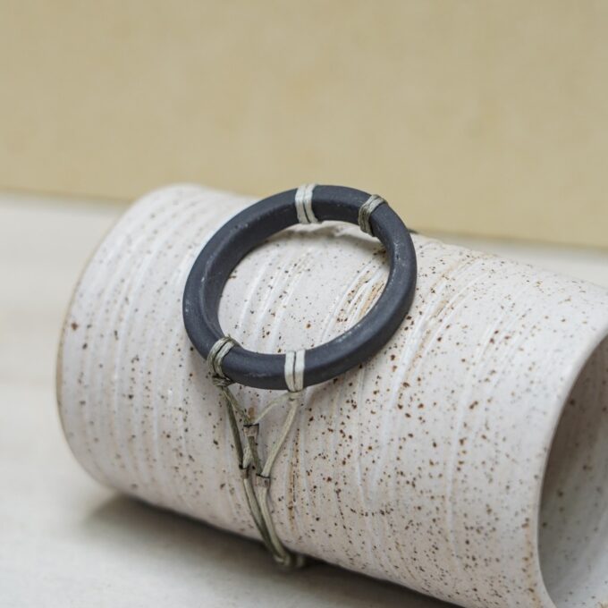 unique waxthread bracelet with handmade matte black porcelain ring