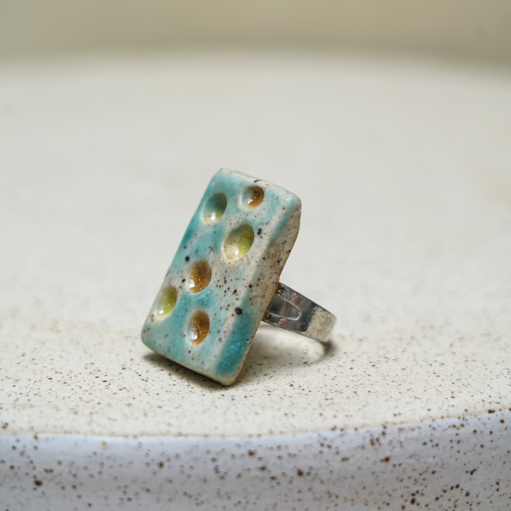 ceramic ring with turquoise handmade ceramic element