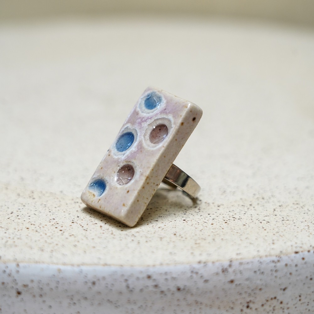 handmade rectangular ceramic ring with blue glaze details