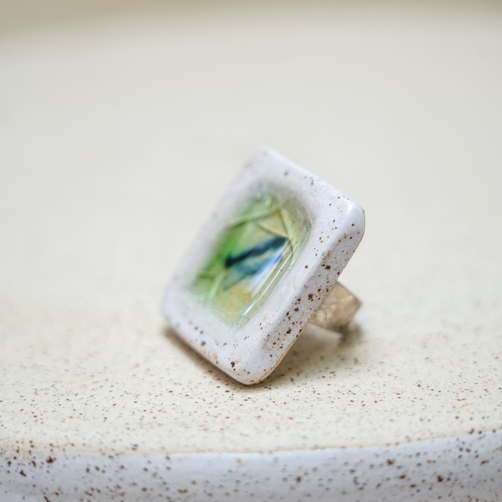 handmade ceramic ring with green blue centre