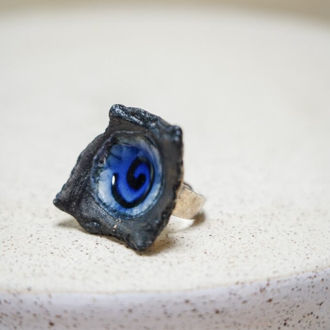 handmade ceramic ring with blue spiral centre