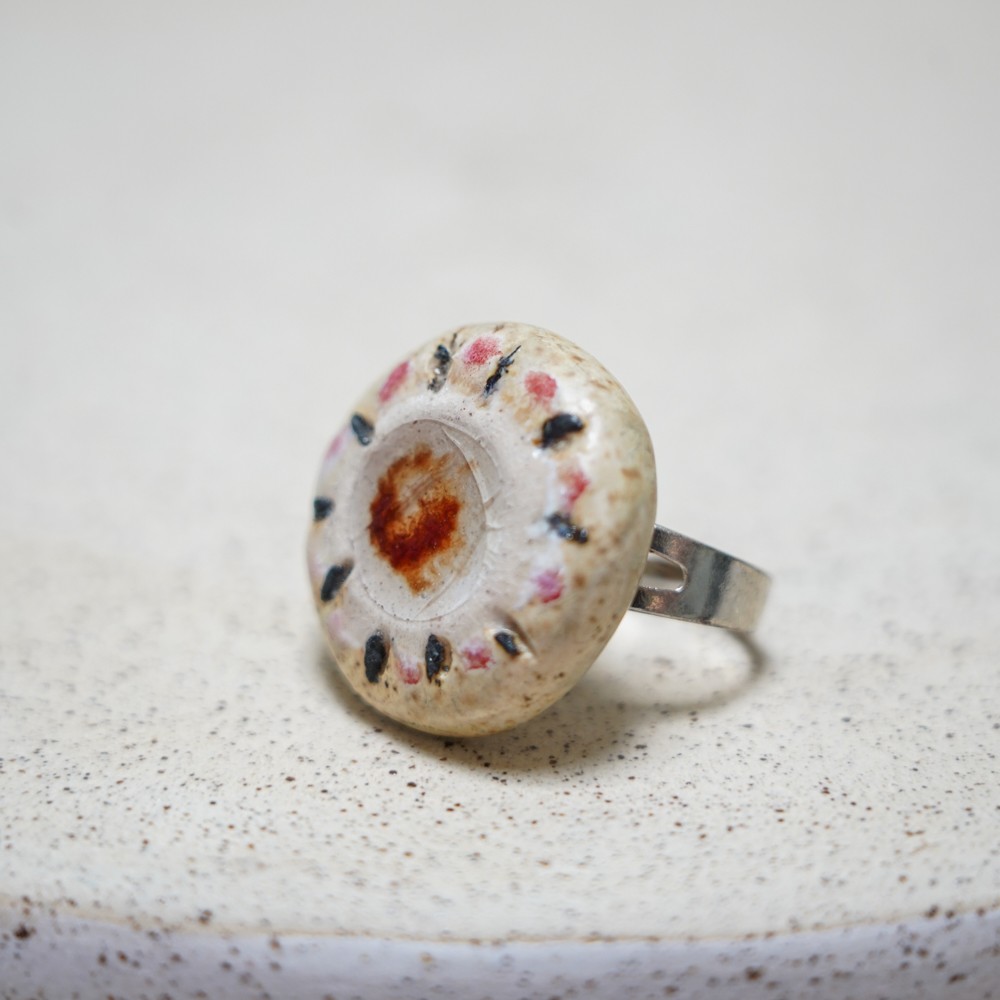 ceramic ring with beige round form