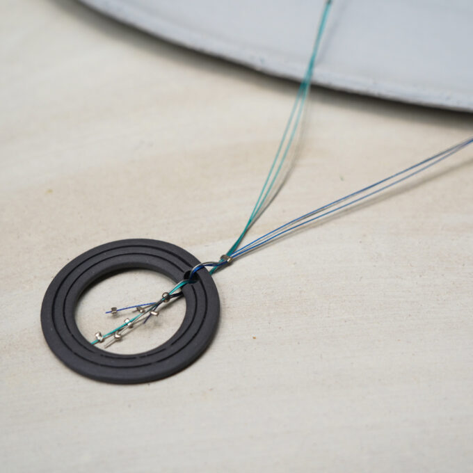 layered dark ceramic wire circle necklace