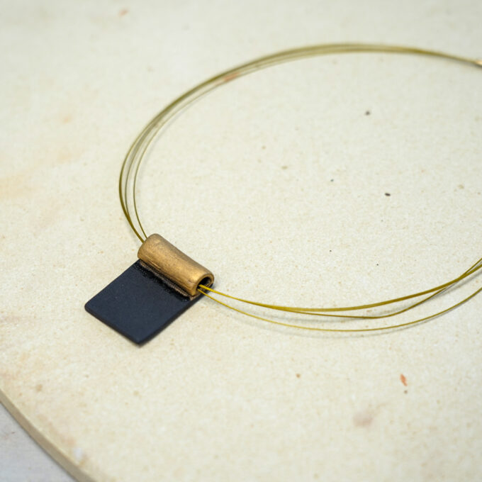 handmade black and gold ceramic jewellery necklace